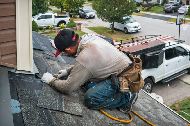 Professional Gutter Installation technician working in Northport, MI